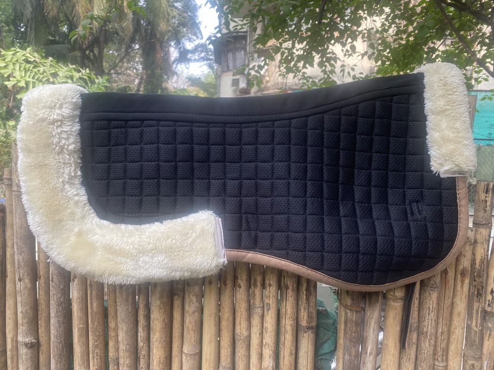 Sheepskin saddle pad  Imported sheepskin saddle pad.