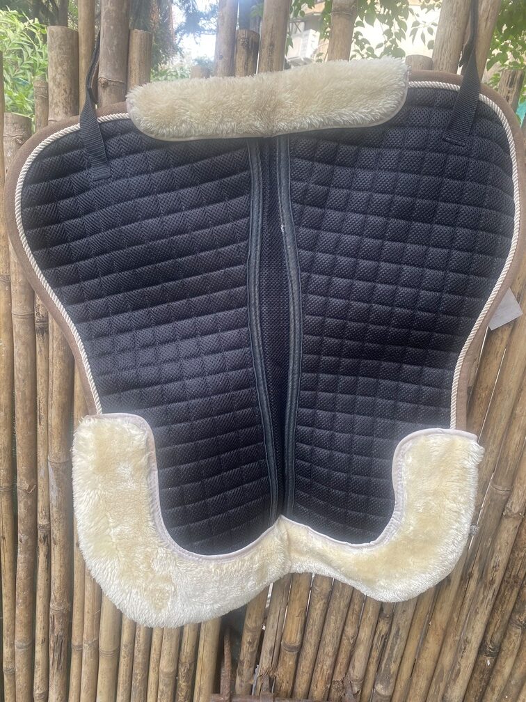 Sheepskin saddle pad  Imported sheepskin saddle pad.
